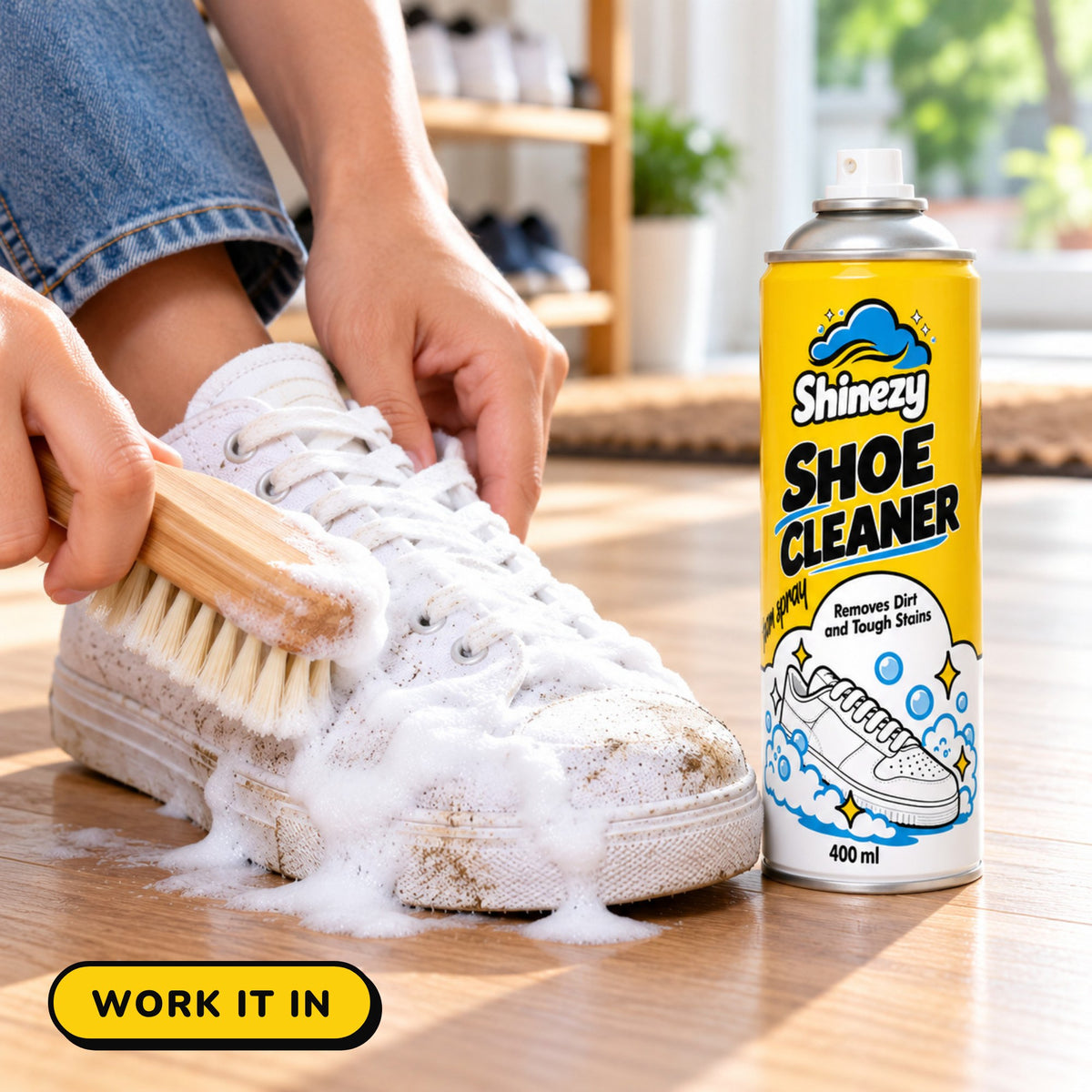 Working Shinezy Shoe Cleaner foam into a sneaker with a soft brush