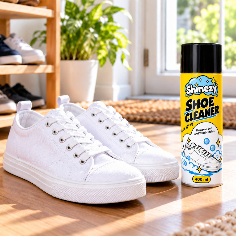 Clean white sneakers air-drying at room temperature beside a can of Shinezy Shoe Cleaner